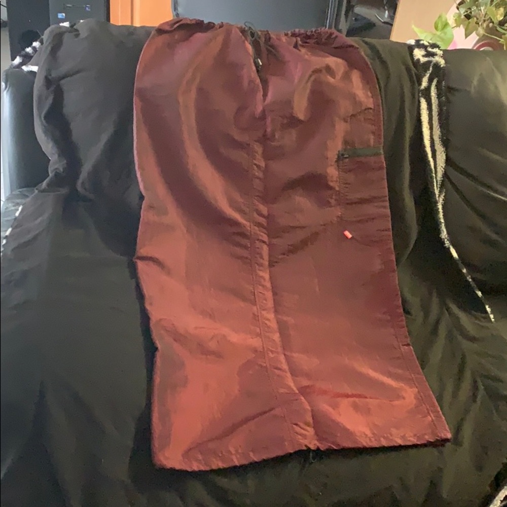 Ecko rare shimmering red with a black under tone skirt